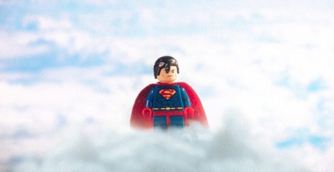 lego superman in clouds as proxy for landing page hero image