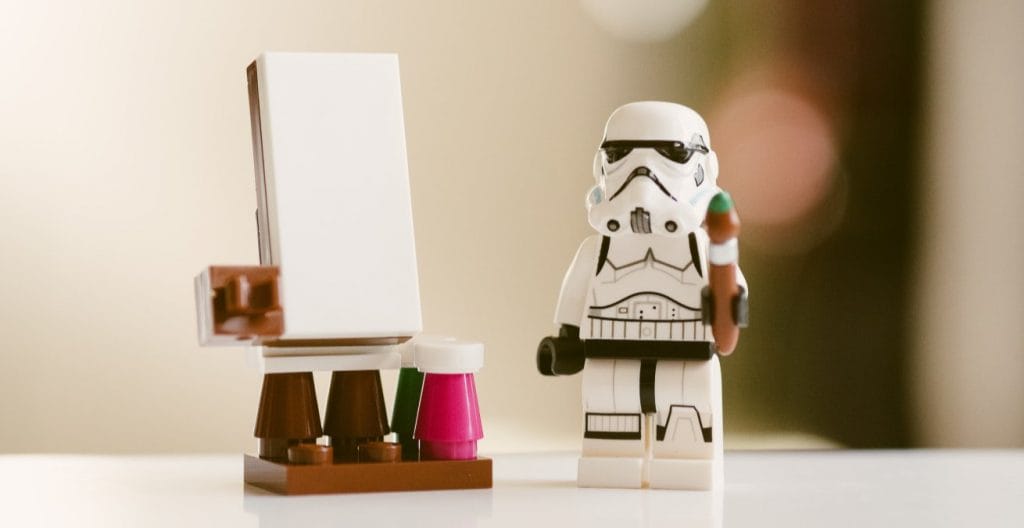 lego storm trooper about to start painting as proxy for building a motivation mindset